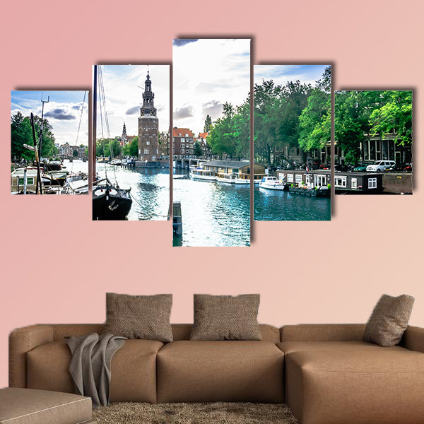 View on canal and traditional buildings in Amsterdam multi panel canvas wall art