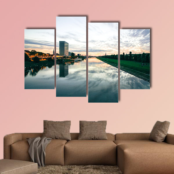Scenic sunset over a river in a city in Germany multi panel canvas wall art