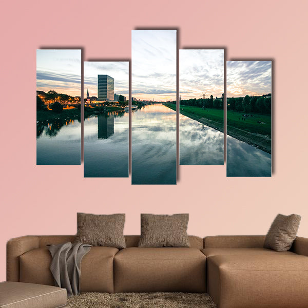 Scenic sunset over a river in a city in Germany multi panel canvas wall art