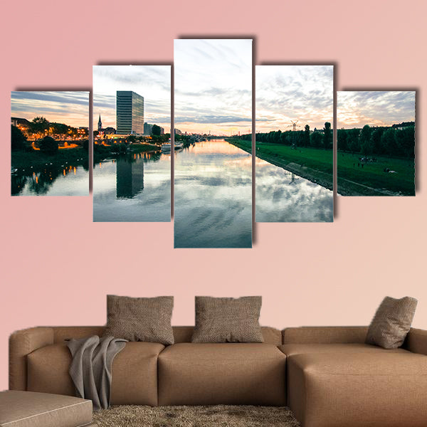 Scenic sunset over a river in a city in Germany multi panel canvas wall art