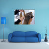 Fixing Hairdo in white make up room, Beauty and haircare concept Multi Panel Canvas Wall Art