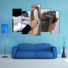 Fixing Hairdo in white make up room, Beauty and haircare concept Multi Panel Canvas Wall Art