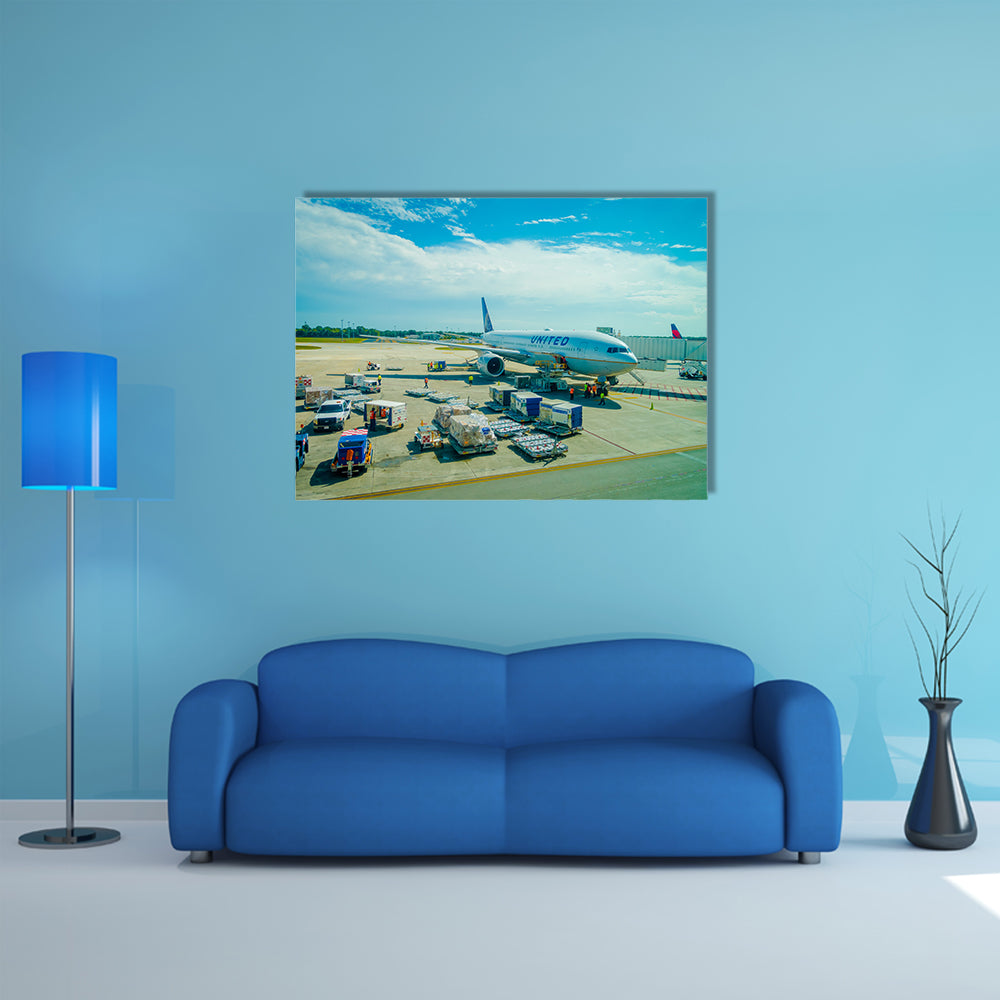 Airplanes on the runway of Cancun International Airport in Mexico Multi Panel Canvas Wall Art