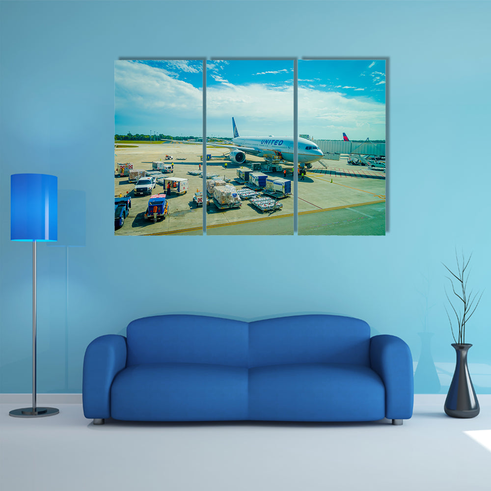 Airplanes on the runway of Cancun International Airport in Mexico Multi Panel Canvas Wall Art