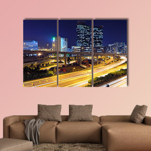 Traffic in modern city at night multi panel canvas wall art