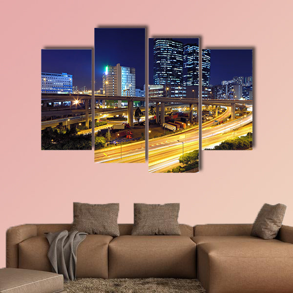 Traffic in modern city at night multi panel canvas wall art