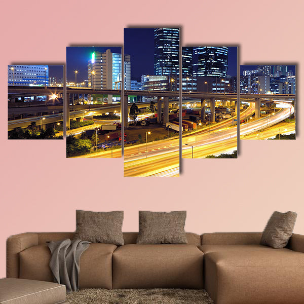 Traffic in modern city at night multi panel canvas wall art