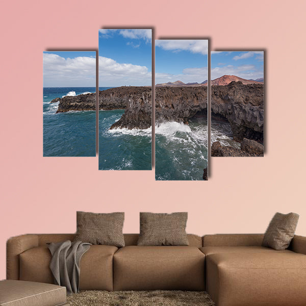 Lanzarote landscape, Los Hervideros coastline, lava caves, cliffs and wavy ocean