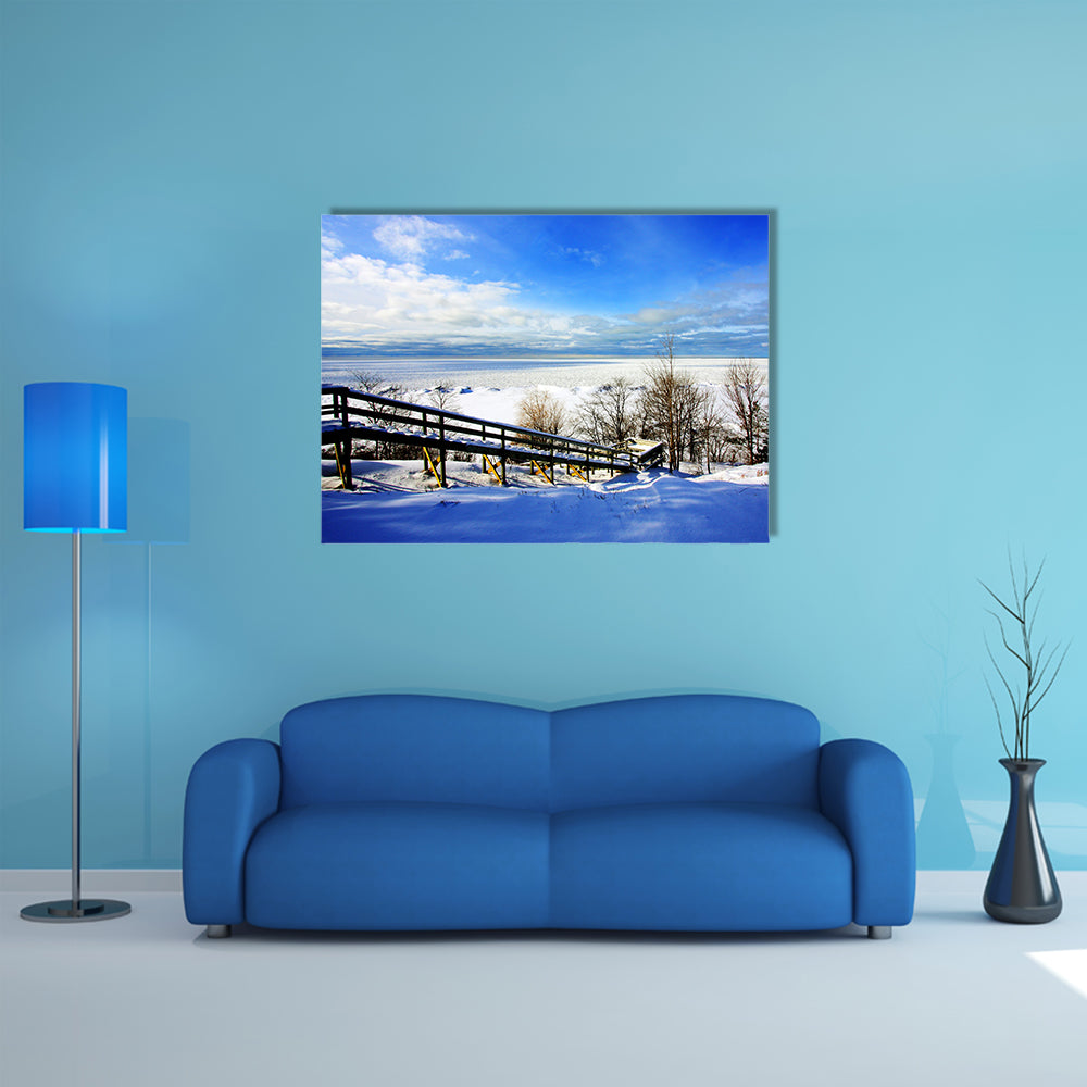 A beautiful winter scene at a lake multi panel canvas wall art