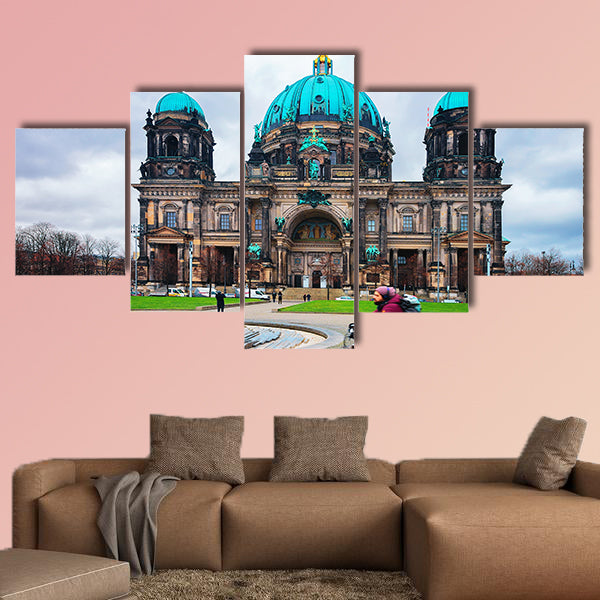 Man riding a bicycle at Berliner Dom Cathedral in Berlin on Mitte Island, wall art