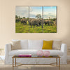 African elephants with baby on the masai mara kenya Africa Multi Panel Canvas Wall art