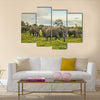 African elephants with baby on the masai mara kenya Africa Multi Panel Canvas Wall art