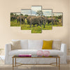 African elephants with baby on the masai mara kenya Africa Multi Panel Canvas Wall art