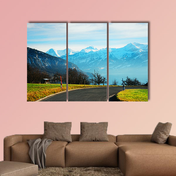 Road at Sigrilwil village in front of Swiss Alps Mountains multi panel canvas wall art