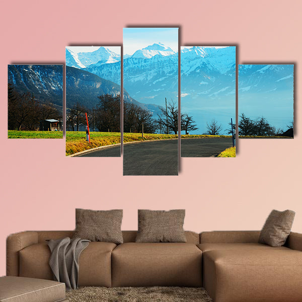 Road at Sigrilwil village in front of Swiss Alps Mountains multi panel canvas wall art