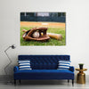 Old baseball, glove, and bat on field with base Multi Panel Canvas Wall Art