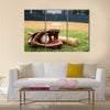 Old baseball, glove, and bat on field with base and outfield in background Multi panel canvas wall art