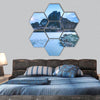 Volcanic rocky hill covered by snow hexagonal canvas wall art