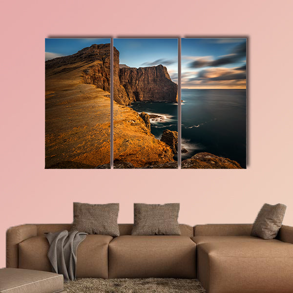High cliffs of Vagar Island in sunset, Faroe Islands Multi panel canvas wall art