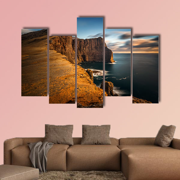 High cliffs of Vagar Island in sunset, Faroe Islands Multi panel canvas wall art