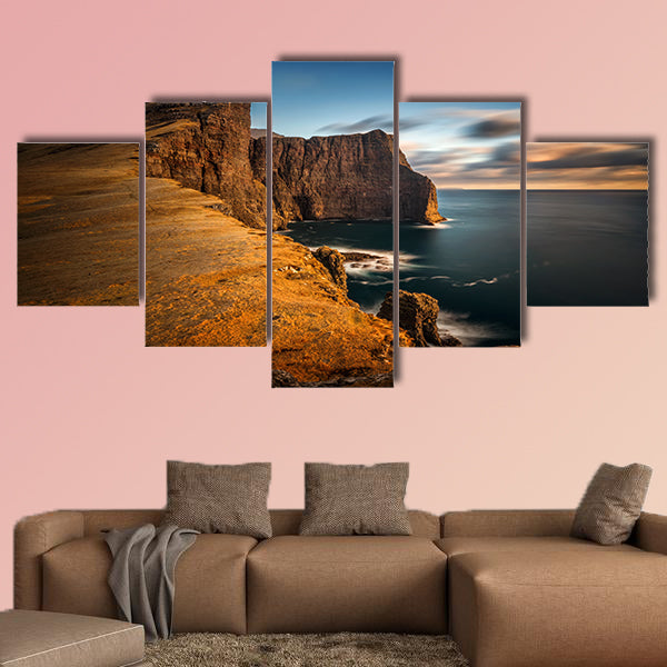 High cliffs of Vagar Island in sunset, Faroe Islands Multi panel canvas wall art