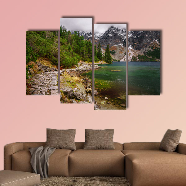 Rocky road along the shore of a mountain lake in High Tatras in autumn