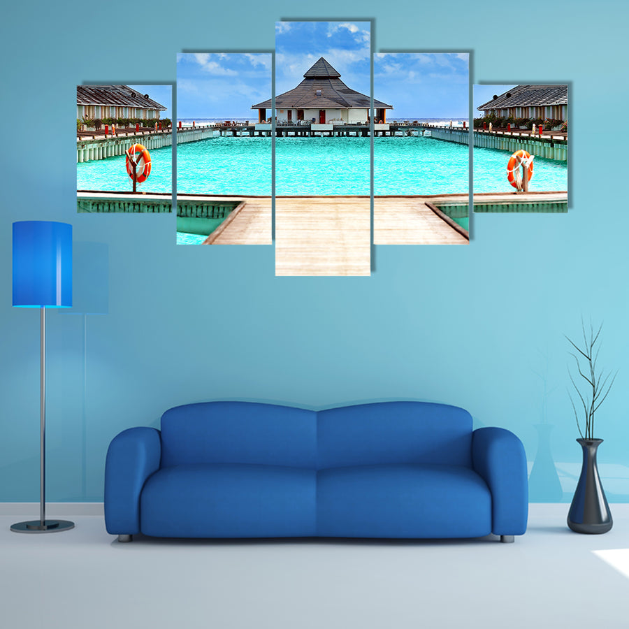 The Wooden pontoon and modern beach houses Multi Panel Canvas Wall Art