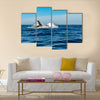 Humpback whale breaching on pacific ocean background Multi panel canvas wall art