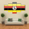 Flags of Uganda in the form of a magnet on refrigerator with reflections light illustration Multi panel canvas wall art