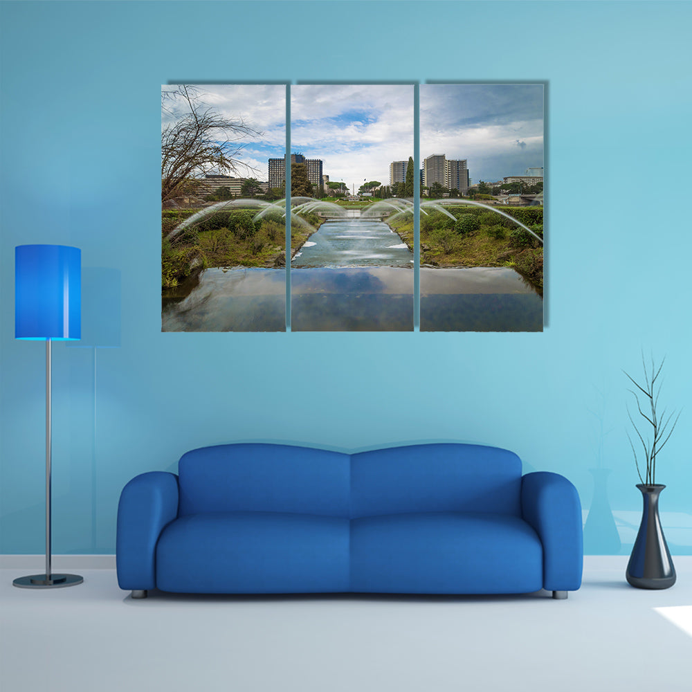 The artificial waterfall in the big fountain of EUR artificial lake, multi panel canvas wall art