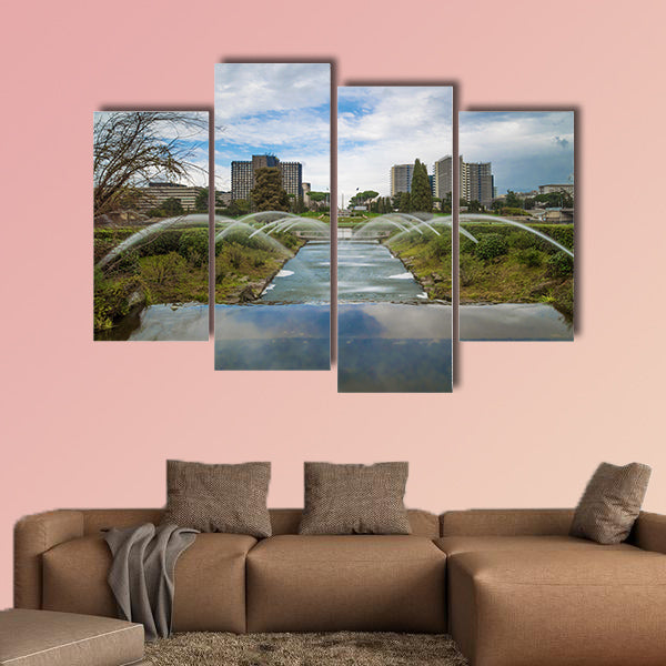 The artificial waterfall in the big fountain of EUR artificial lake multi panel canvas wall art