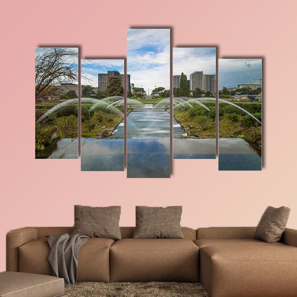 The artificial waterfall in the big fountain of EUR artificial lake multi panel canvas wall art