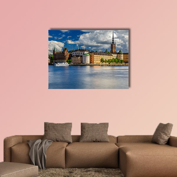 Tourist ferry on Lake Malaren with traditional gothic buildings wall art