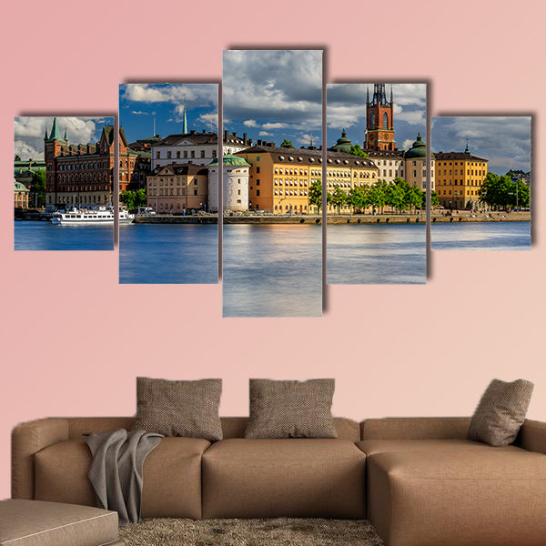 Tourist ferry on Lake Malaren with traditional gothic buildings wall art