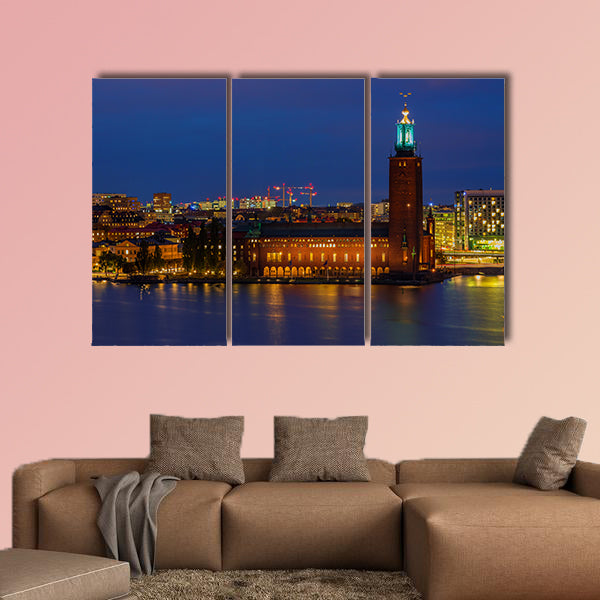 Sunset view across Lake Malaren onto City Hall, Sweden multi panel canvas wall art