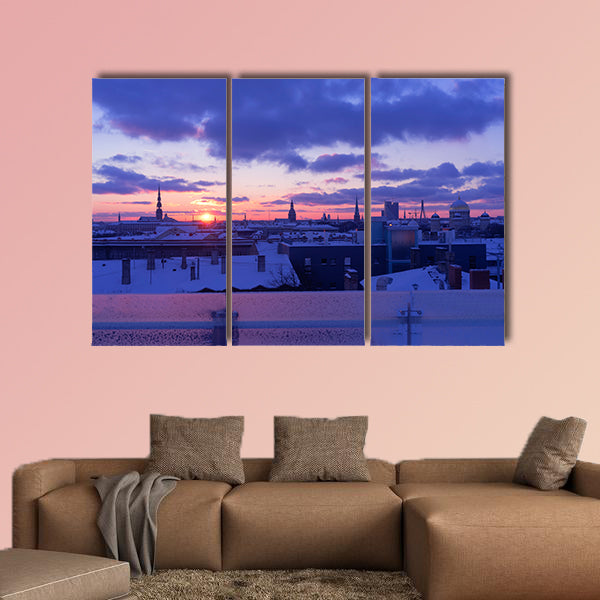 Sunset in purple tones of the city of Riga in winter multi panel canvas wall art