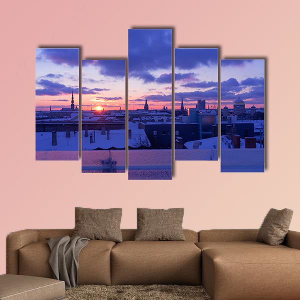 Sunset in purple tones of the city of Riga in winter multi panel canvas wall art