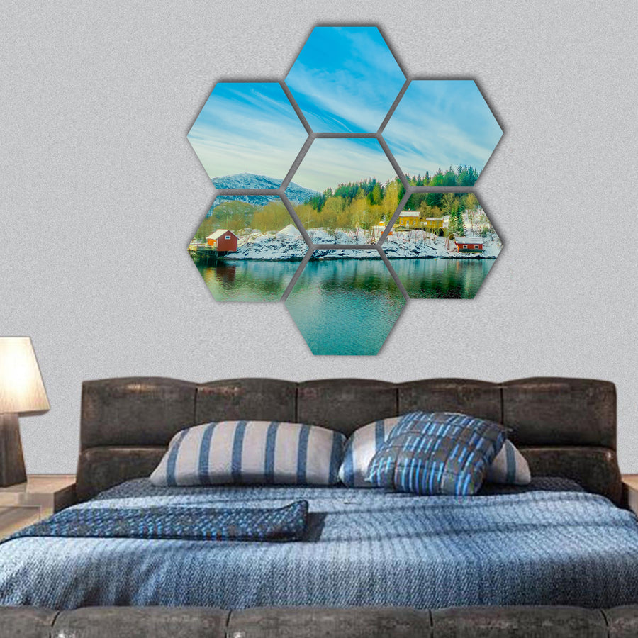 outdoor view of wooden houses in a coastal scene hexagonal canvas wall art