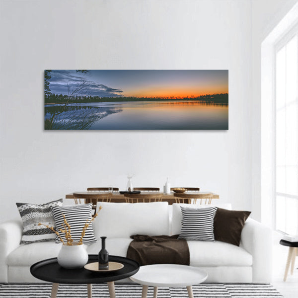 Sunset over the lake clear sky and reflections in water panoramic canvas wall art