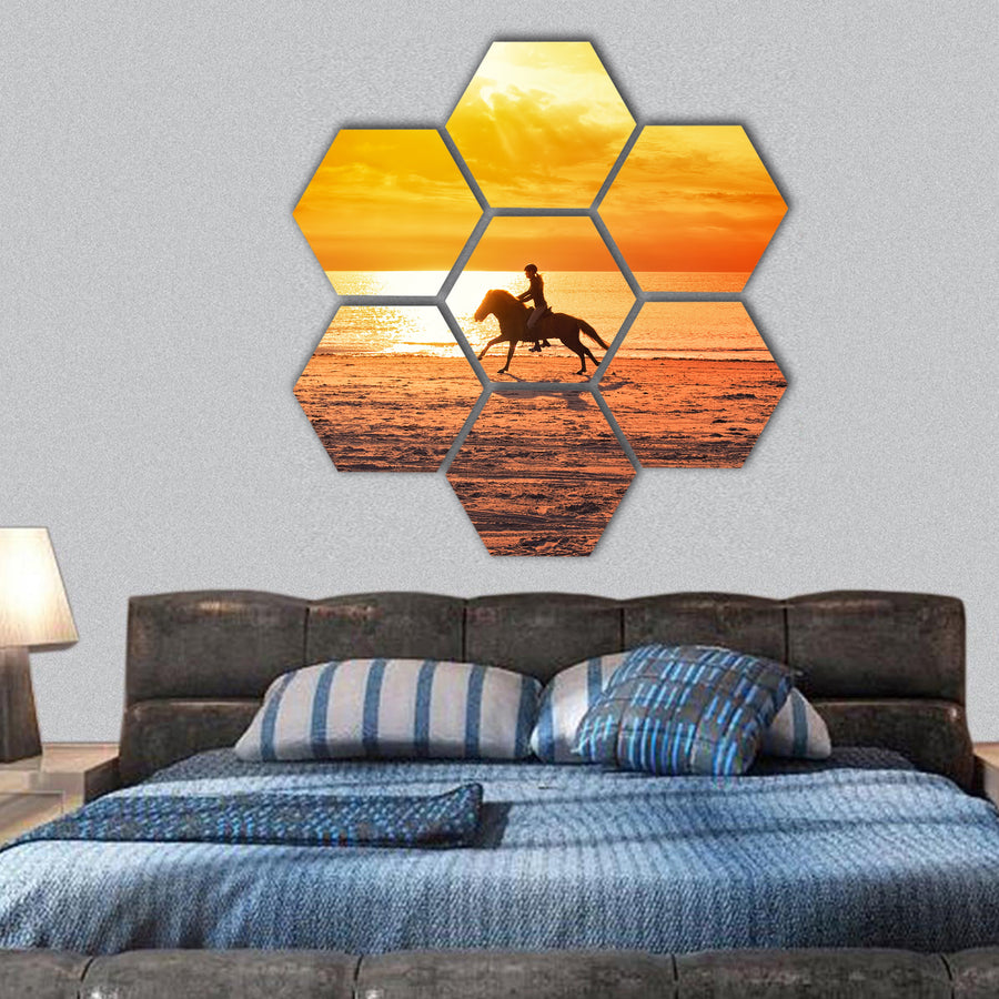 horse riding on the beach at sunset hexagonal canvas wall art