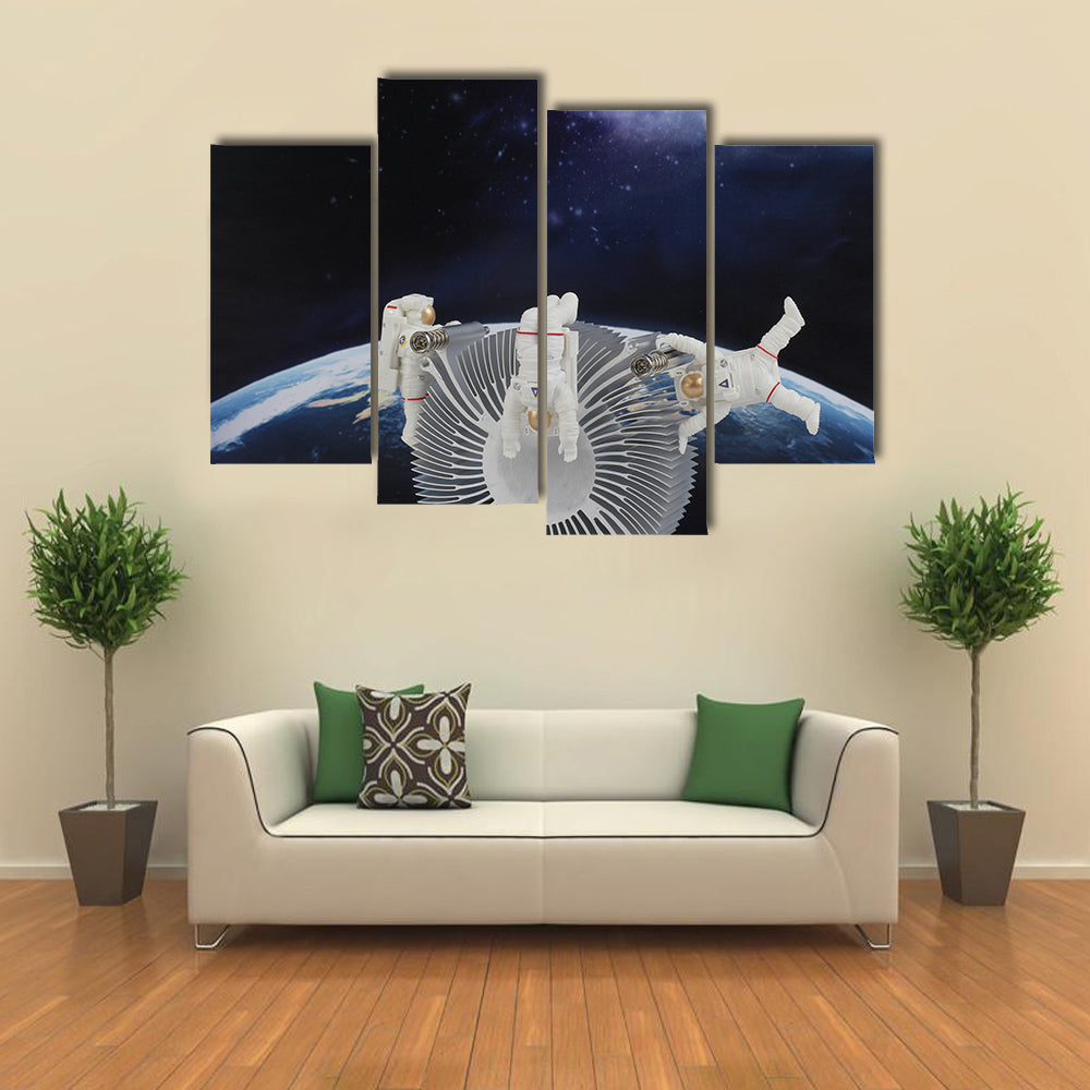 Astronauts In The Zero Gravity Multi Panel Canvas Wall Art