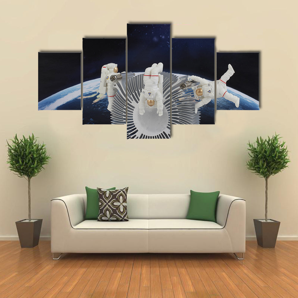 Astronauts In The Zero Gravity Multi Panel Canvas Wall Art
