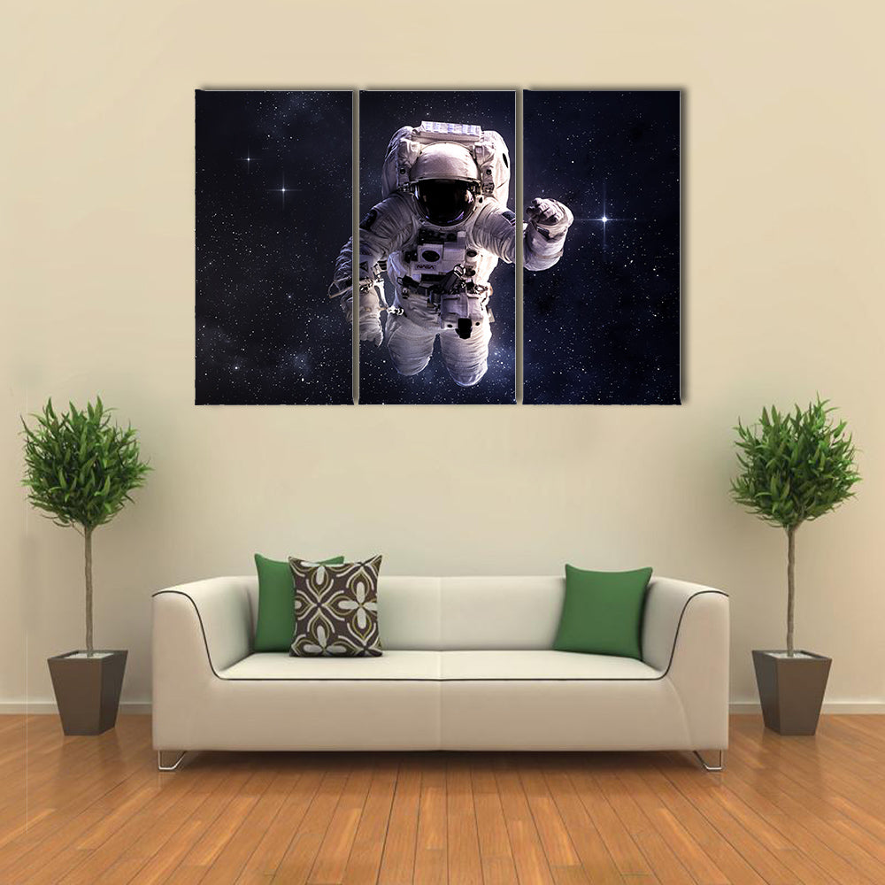 Astronaut Wandering In Outer Space Multi Panel Canvas Wall Art