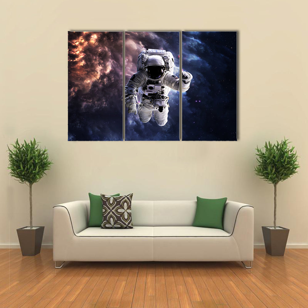 Astronaut In Outer Space Multi Panel Canvas Wall Art
