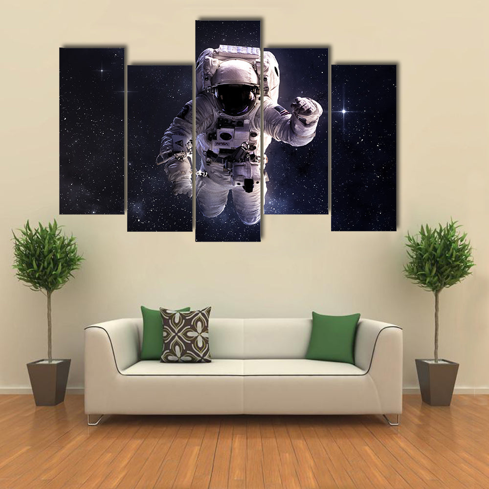 Astronaut Wandering In Outer Space Multi Panel Canvas Wall Art