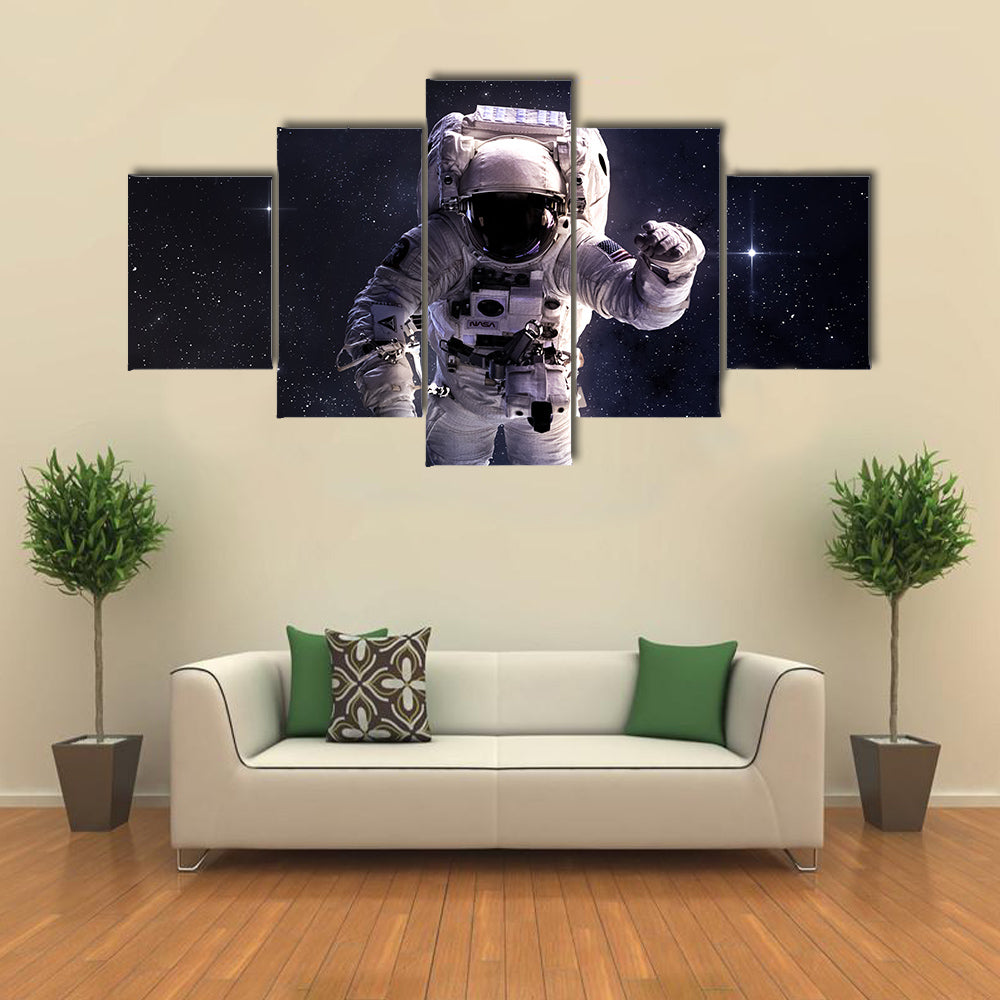 Astronaut Wandering In Outer Space Multi Panel Canvas Wall Art
