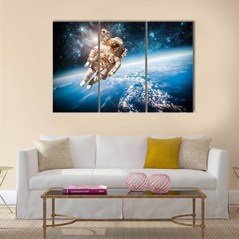 Astronaut’s Voyage In The Space Multi Panel Canvas Wall Art