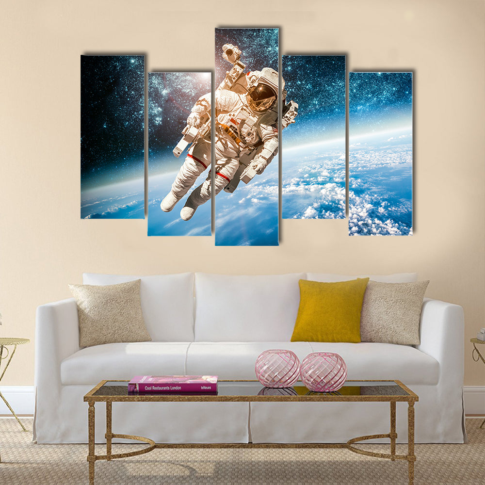 Astronaut’s Voyage In The Space Multi Panel Canvas Wall Art
