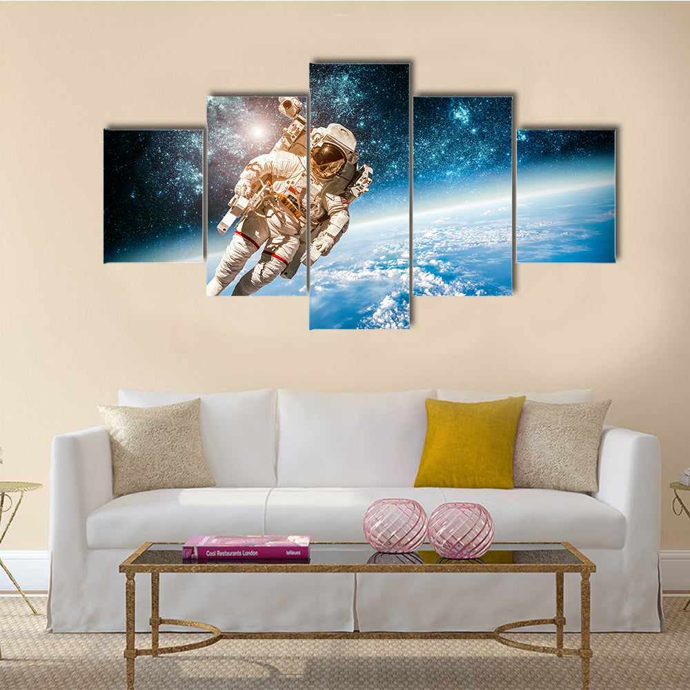 Astronaut’s Voyage In The Space Multi Panel Canvas Wall Art