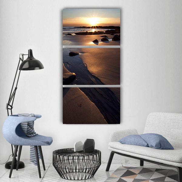 Beach dawn ocean rocks sand sea Vertical Canvas Wall Art